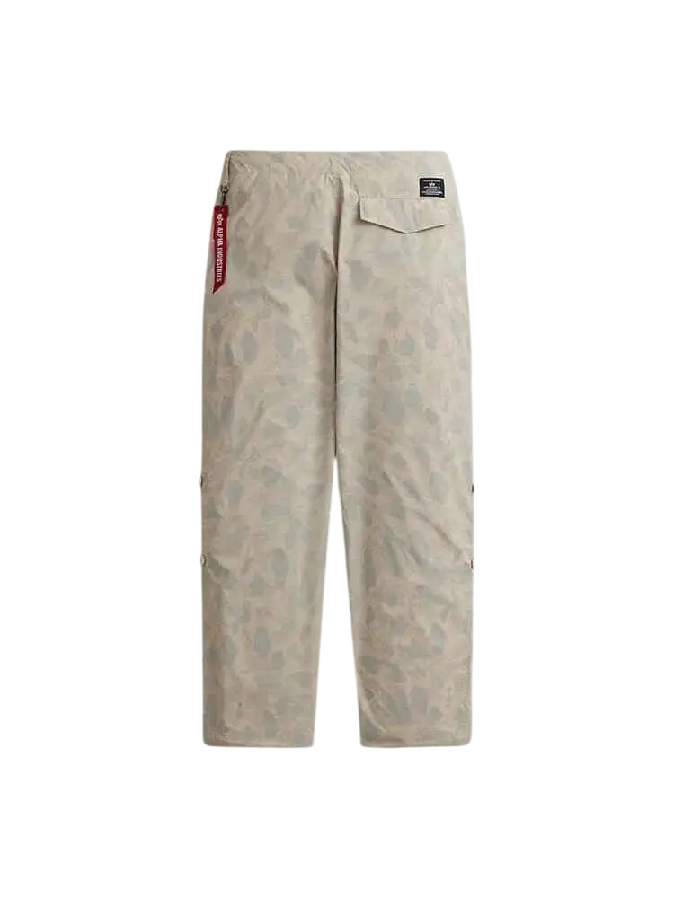 Alpha Industries lightweight parachute pants in limestone frogskin camo beige with red side tag and black waistband label