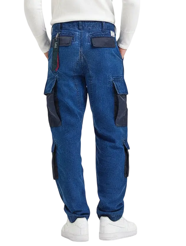 Blue denim cargo pants with dark gray fabric accents on side and back patch pockets from Alpha Industries X Lee