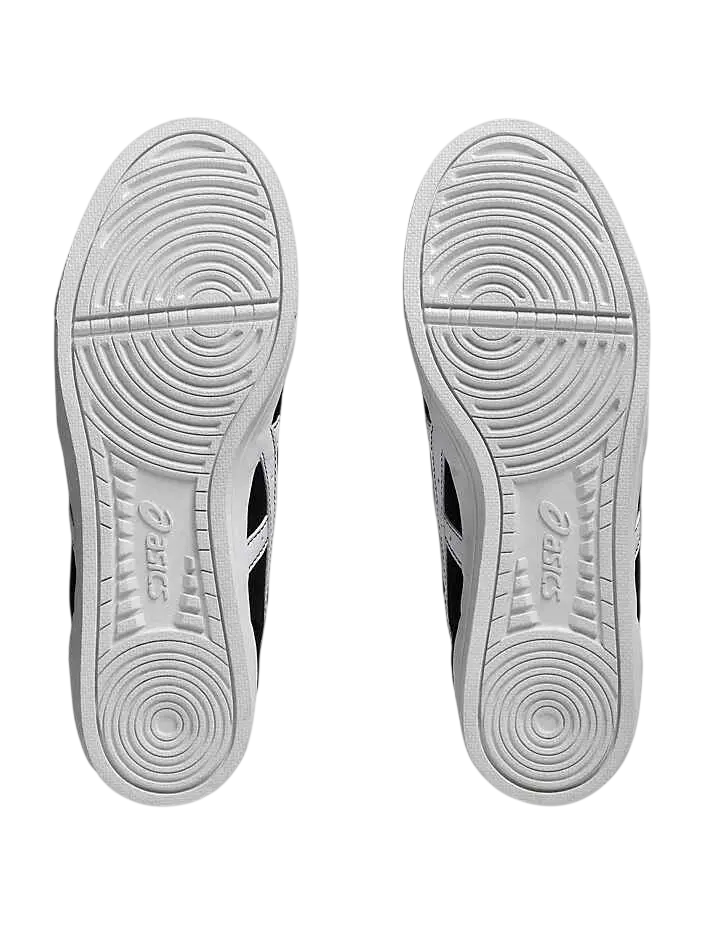 White rubber shoe soles with concentric circular tread patterns and embossed asics branding on asics aaron pro black white