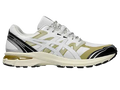 Asics gel-terrain white and gold running shoe with black accents and translucent yellow air unit in the heel