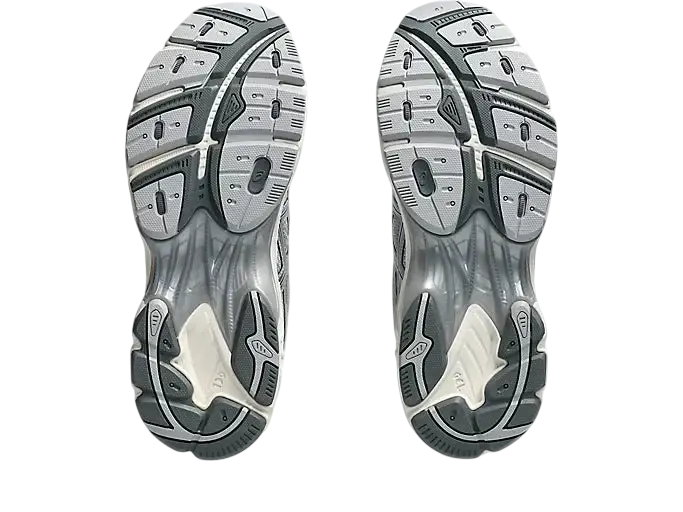 Gray and white asics gt-2160 piedmont grey deep marine athletic shoe soles with textured tread design for grip