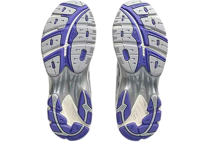 Purple and silver textured grippy soles of asics gt-2160 white blue violet running shoes shown from the back side