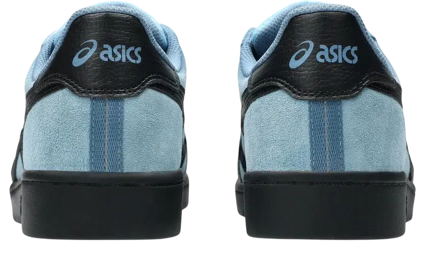 Light blue suede Asics Japan Pro Arctic Sky sneakers with black rubber soles and heel tabs shown from the back side