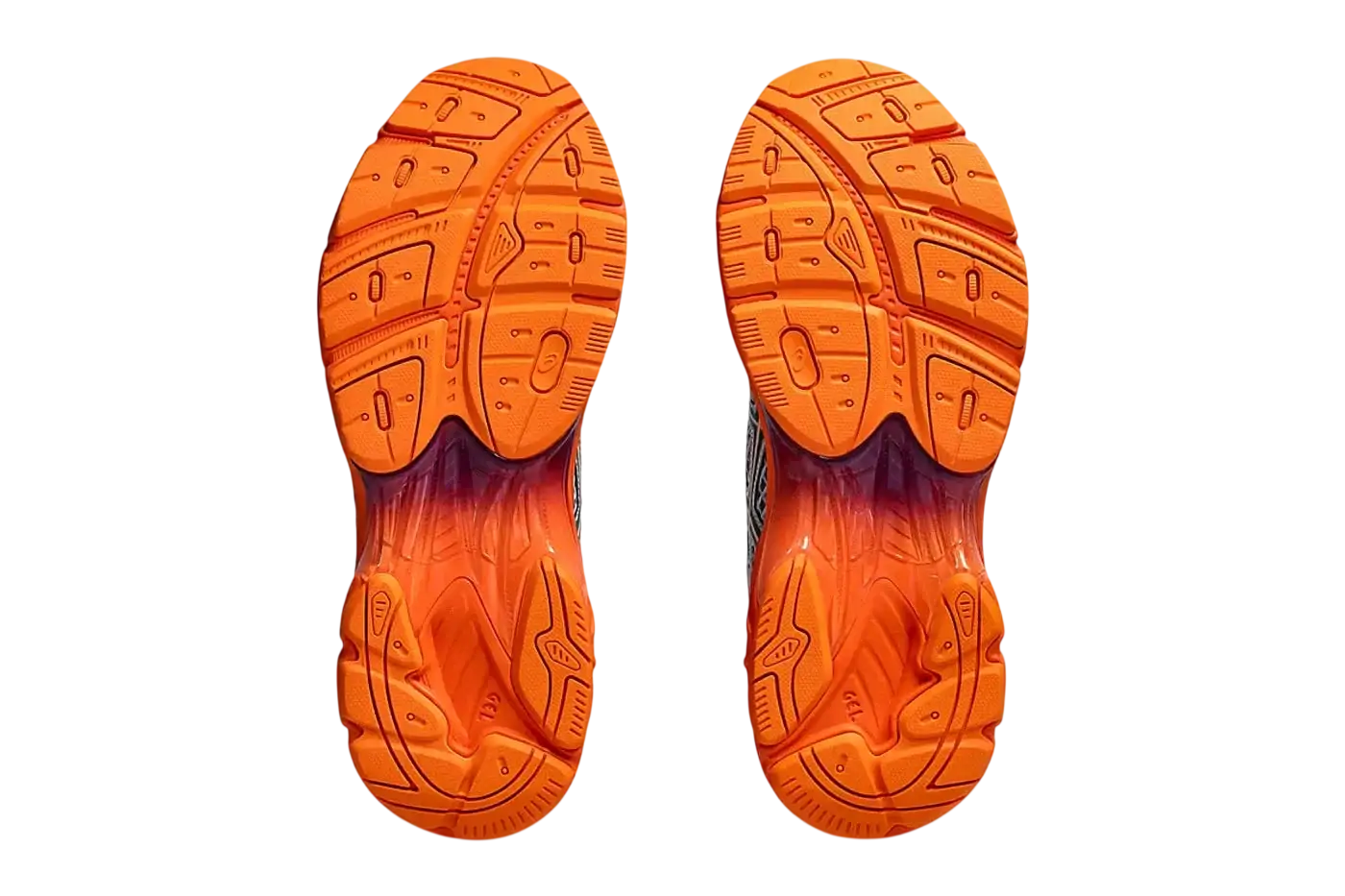 Vibrant orange rubber soles with textured tread on asics x kiko kostadinov ub7-s gt-2160 running shoes