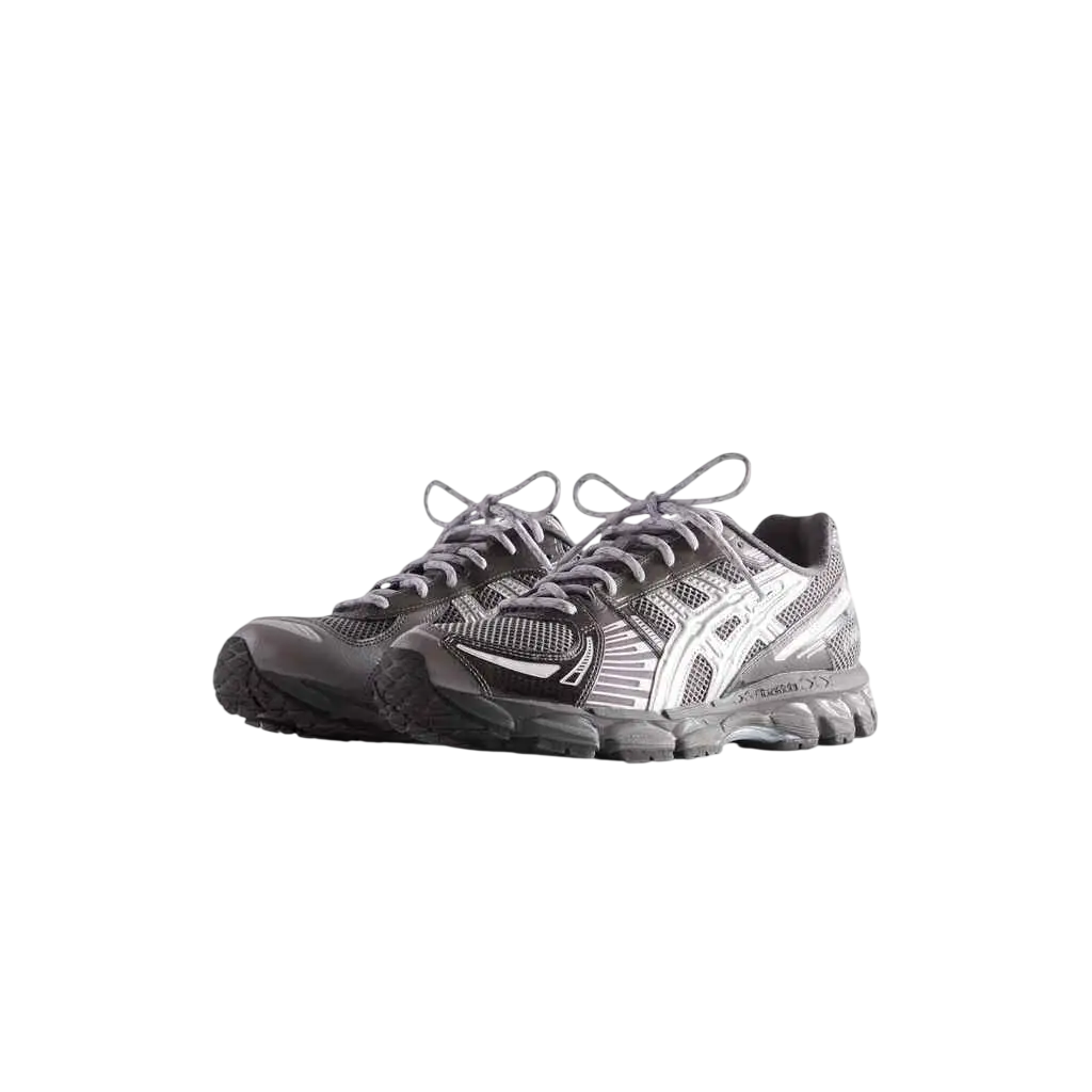 Asics x Kith Gel-Kayano 12.1 running shoes in black and silver with mesh upper white logo and textured rubber sole