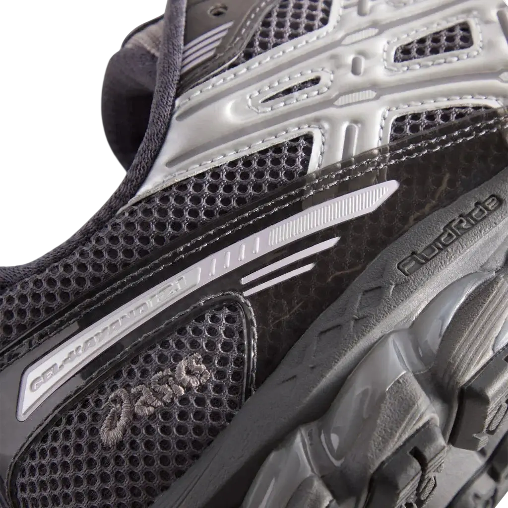 Asics x kith gel-kayano 12.1 running shoe in gray and white with mesh upper rubber outsole and cloudride branding
