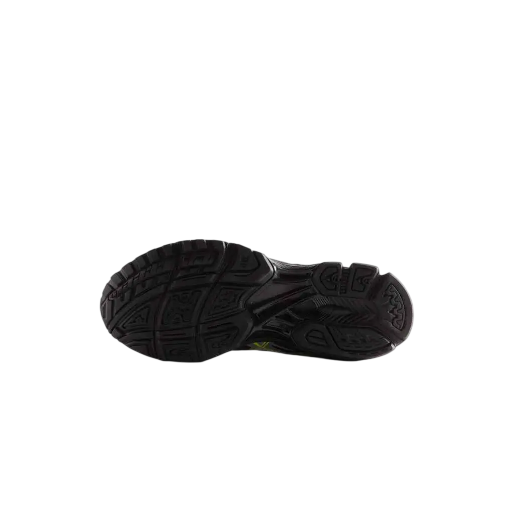 Black rubber sole with textured tread and neon green accent on the heel of asics x kith gel nimbus 10.1 sneakers