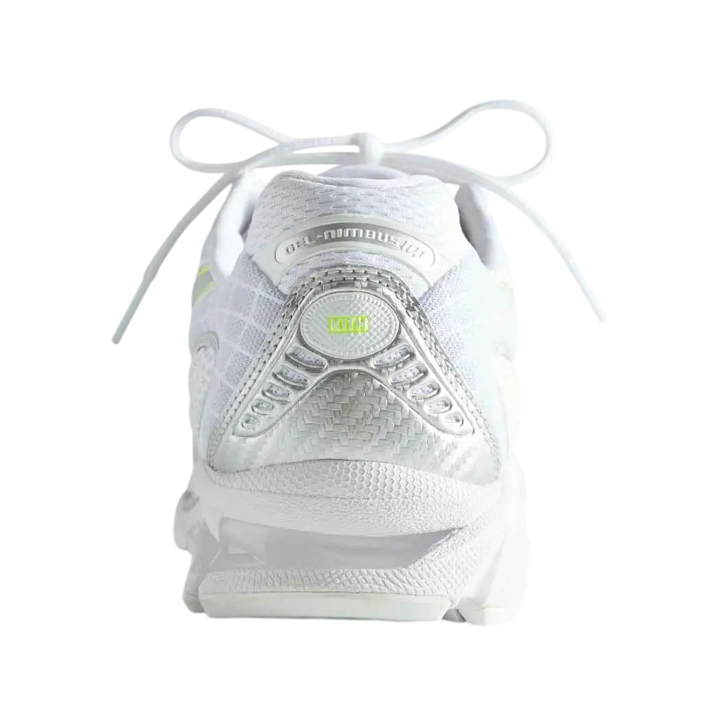 Asics x Kith gel nimbus 10.1 white pure silver running shoe with silver mesh, textured overlays, and lime green midsole accent