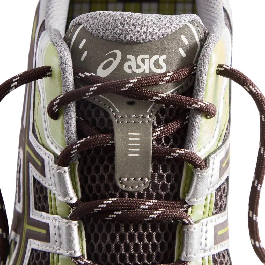 Gray and lime green Asics x Kith Gel-Nunobiki Deliciosoe running shoe with brown laces and white stitching