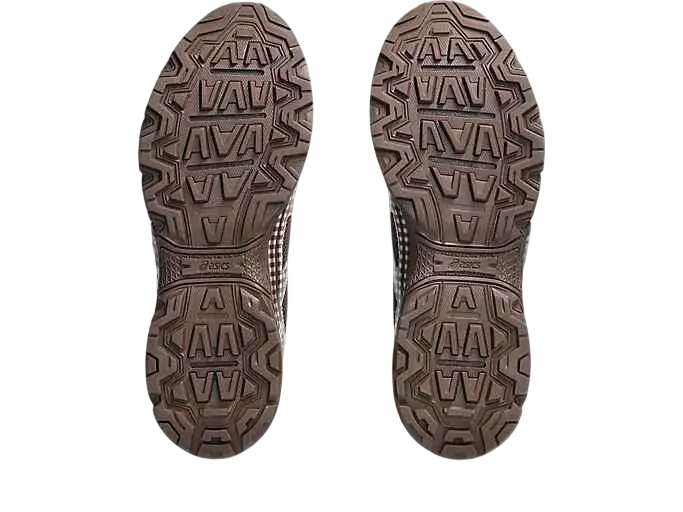 Back side of asics x story mfg gelventure 6 reddish brown sneakers with brown rubber soles and geometric tread pattern