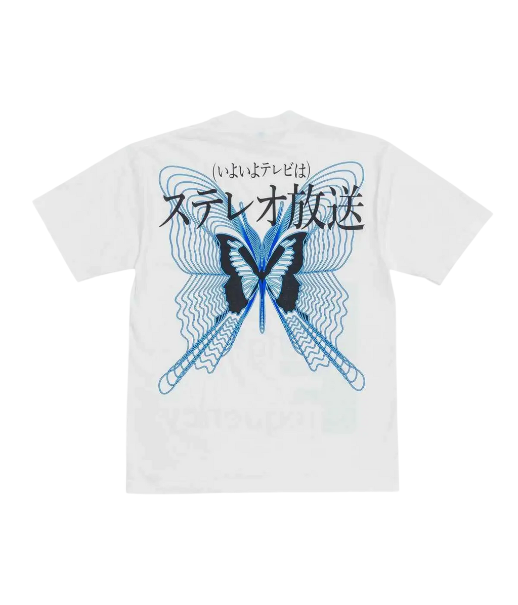 White t-shirt with bold black and blue butterfly graphic and japanese text featuring intricate wave patterns
