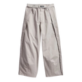 Beige bad bunny x mercedes amg race pants with pleats and vertical seam detailing on outer legs in clear granite color