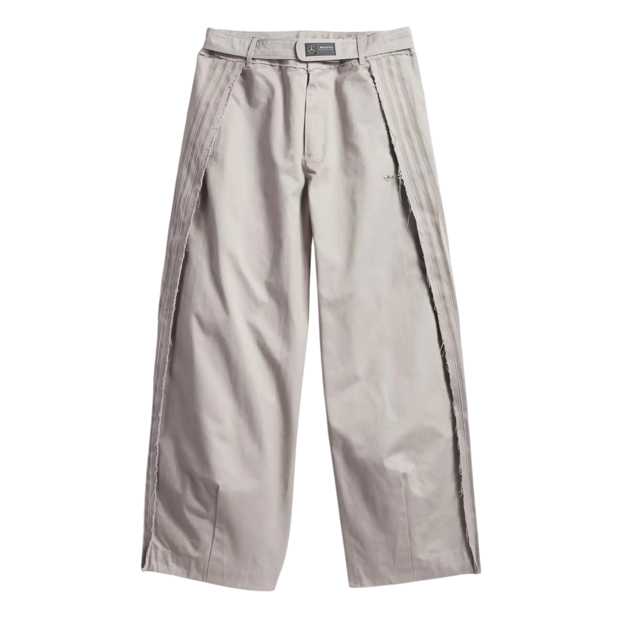 Beige bad bunny x mercedes amg race pants with pleats and vertical seam detailing on outer legs in clear granite color