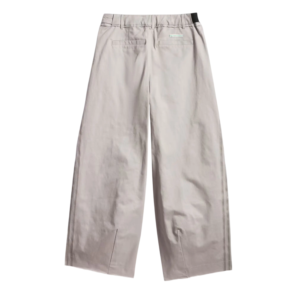 Beige wide-leg bad bunny x mercedes amg race pants in clear granite with relaxed fit and subtle front pockets