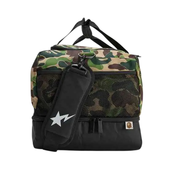 Bape x Adidas camo duffle bag in black and green with mesh side panels and a white star logo on the shoulder strap