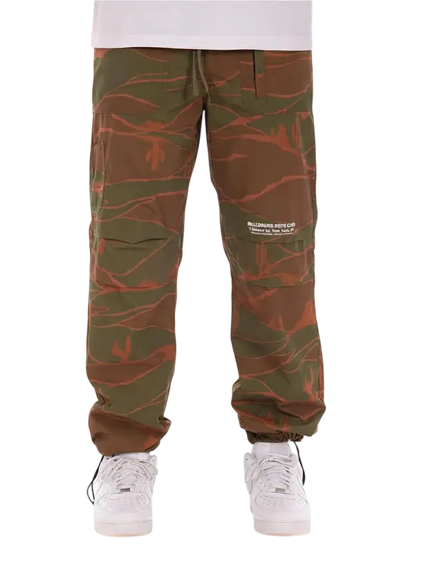 Olive and rust-colored tiger stripe camouflage cargo pants by billionaire boys club in durable fabric for outdoor wear