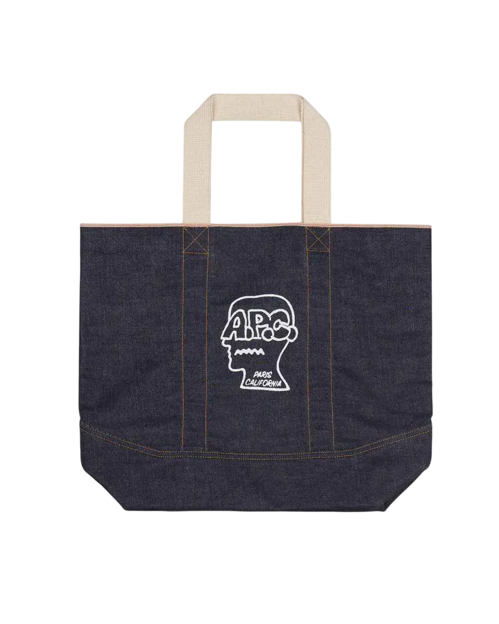 Dark blue denim tote bag with cream handles and white embroidered skull logo by Brain Dead x APC Paris California