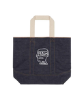 Dark blue denim tote bag with cream handles and white embroidered skull logo by Brain Dead x APC Paris California