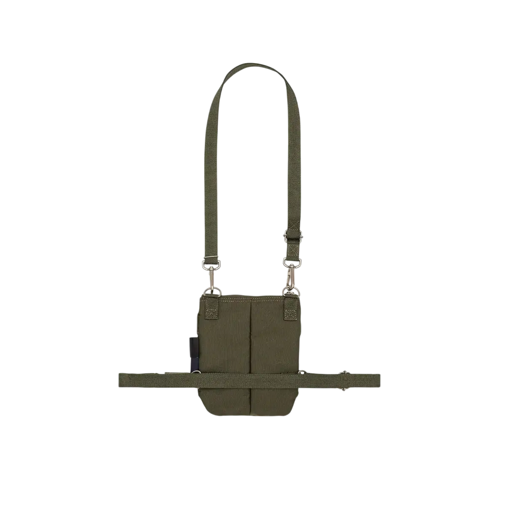 Olive green comme des garcons x porter yoshida cordura tactical crossbody bag with adjustable straps and compartments