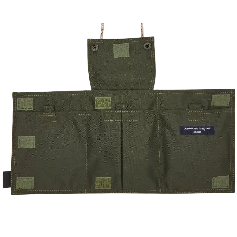 Olive green canvas Comme des Garcons x Porter Yoshida Cordura utility sling pouch with reinforced stitching and branded label