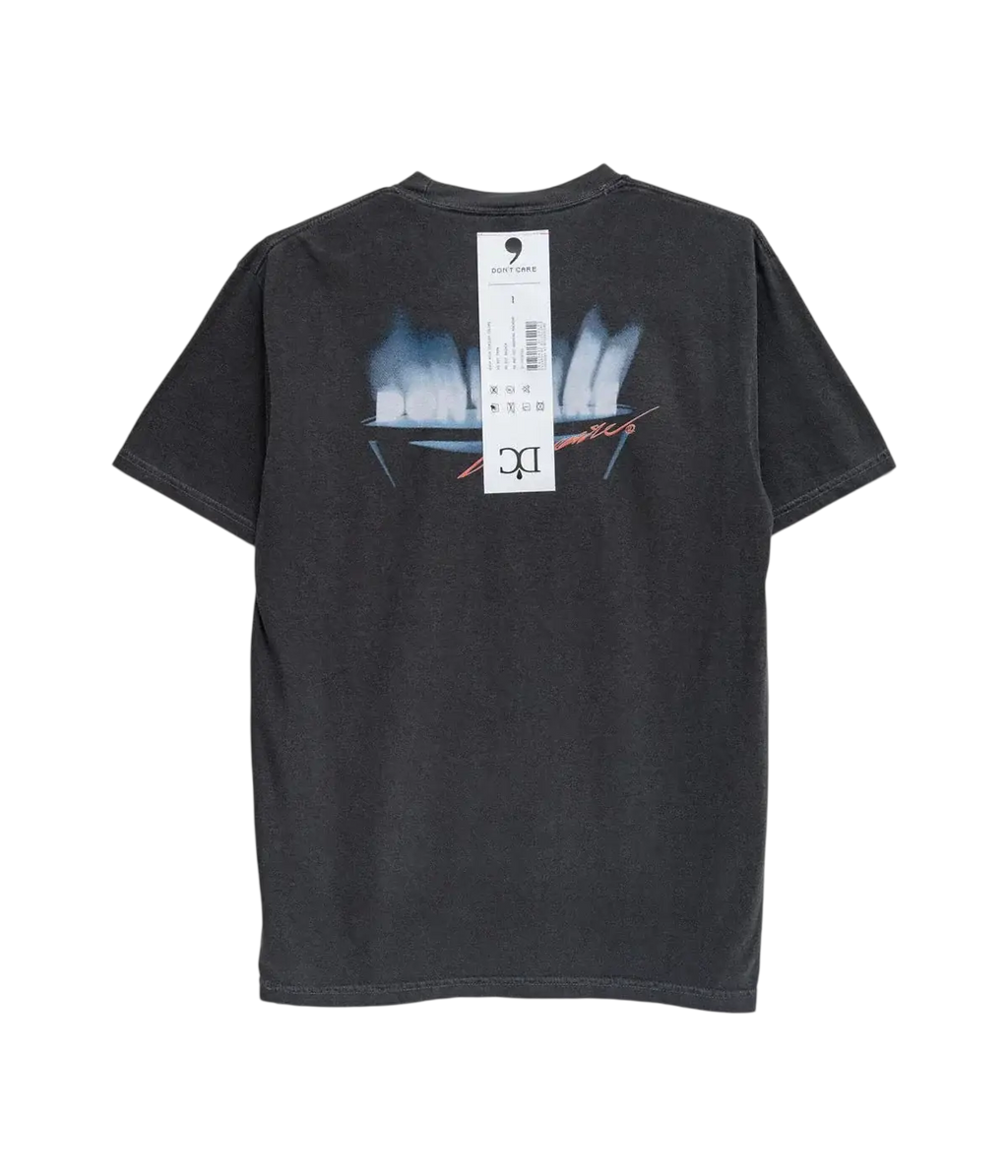 Dark gray short-sleeved dont care t-shirt with faded white and blue flames above black silhouette and red dc logo