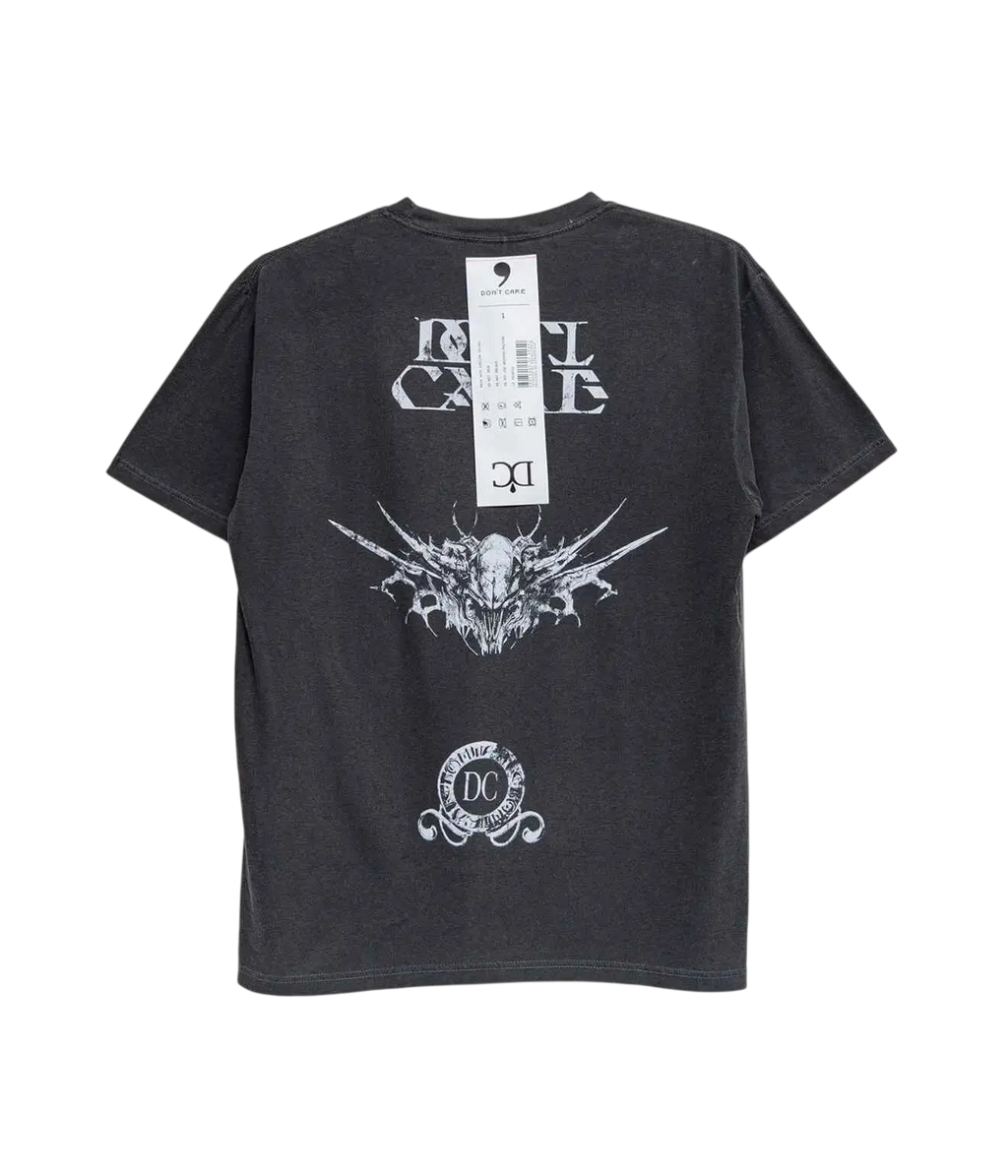 Dark gray short-sleeved cotton t-shirt with white ornate winged skull graphic and dont cry text called dont care tshirt black