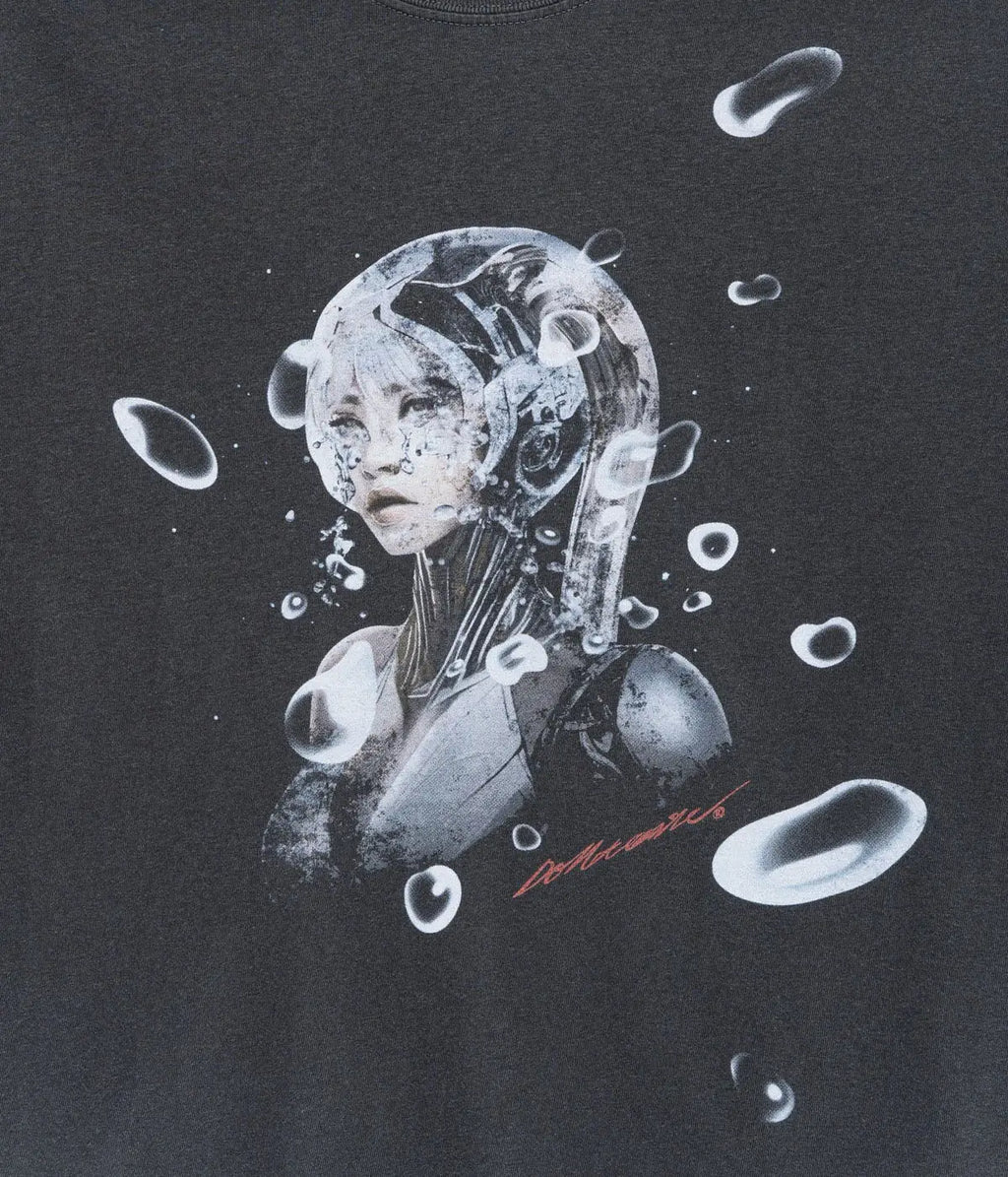 Black cotton t-shirt featuring a detailed grayscale cybernetic woman graphic with floating bubbles titled dont care tee