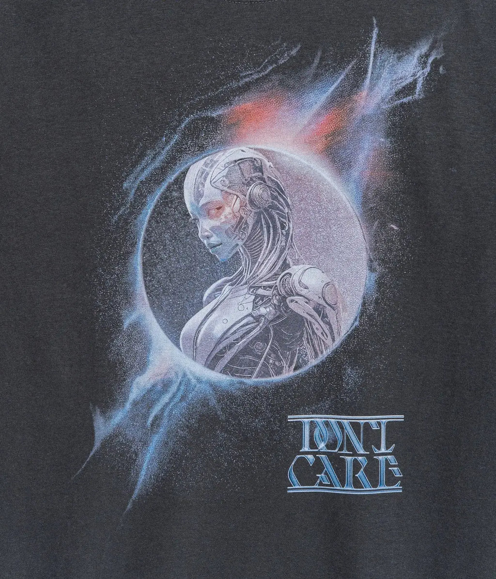 Black don’t care t-shirt featuring a silver and blue futuristic robot woman graphic with glowing energy effects