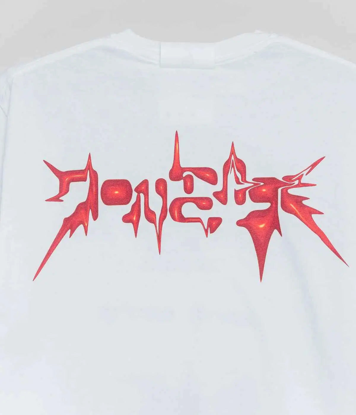 White cotton t-shirt showing the back with bold red stylized lettering for casual wear titled dont care t-shirt white