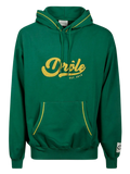 Drole de monsieur Drole sport le hoodie forest green with yellow trim and gold foil drôle est print on front