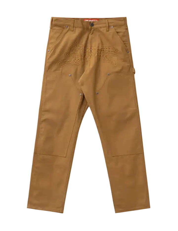 Tan ice cream work pants with embroidered logo on front made from durable canvas material