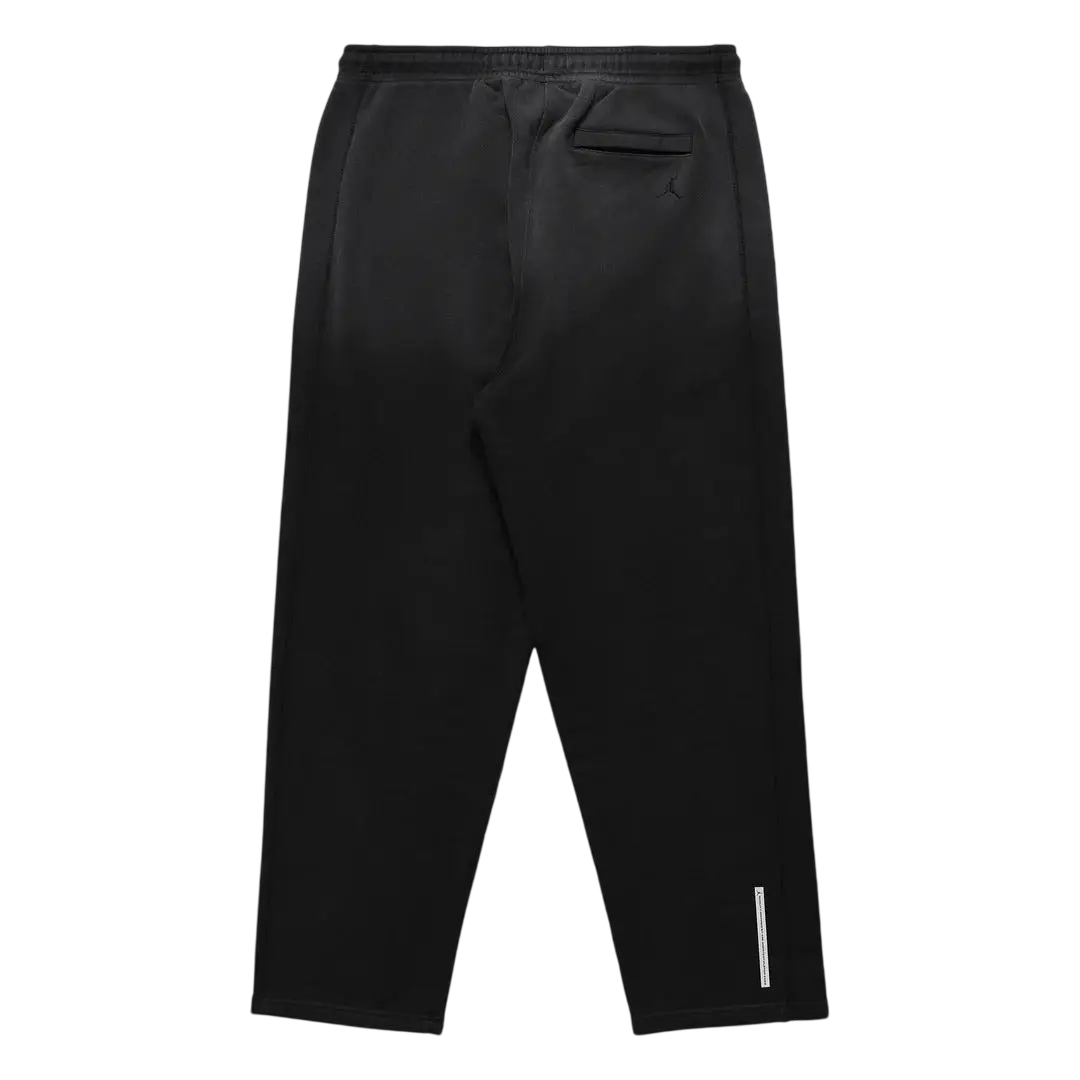 Black moncler sweatpants with a subtle reflective stripe on the lower leg.