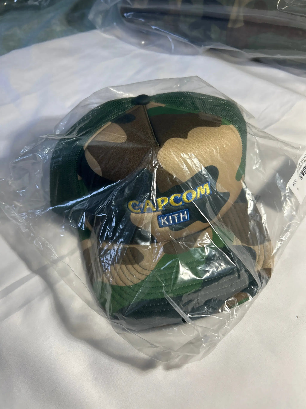 Kith Capcom Nolan Trucker Hat Camo