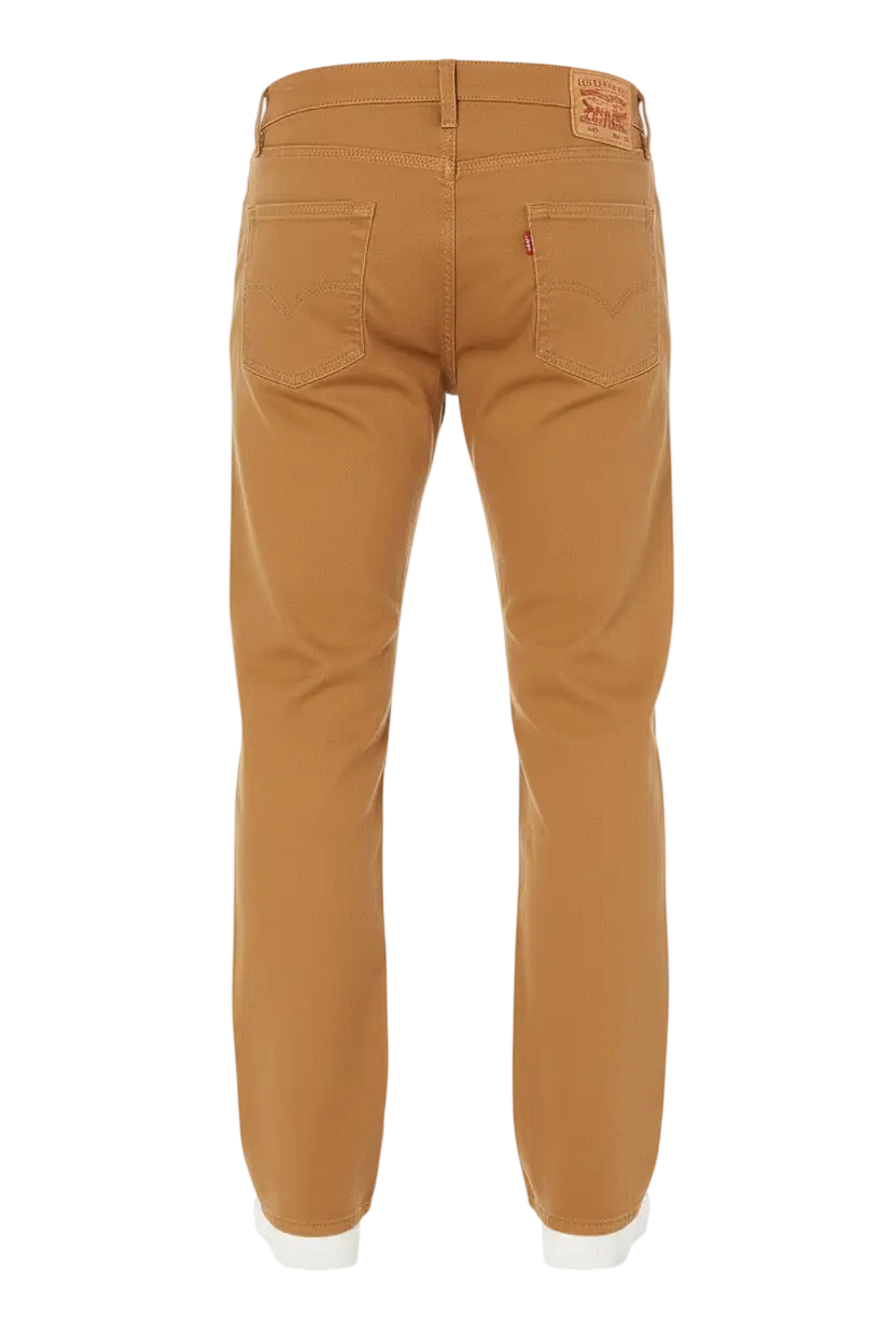 Back view of levi’s 513 slim straight tan jeans with classic five-pocket design and brown leather brand patch
