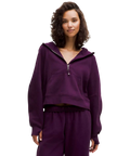 Purple lululemon scuba oversized half zip hoodie with matching sweatpants in dramatic magenta shown from front view