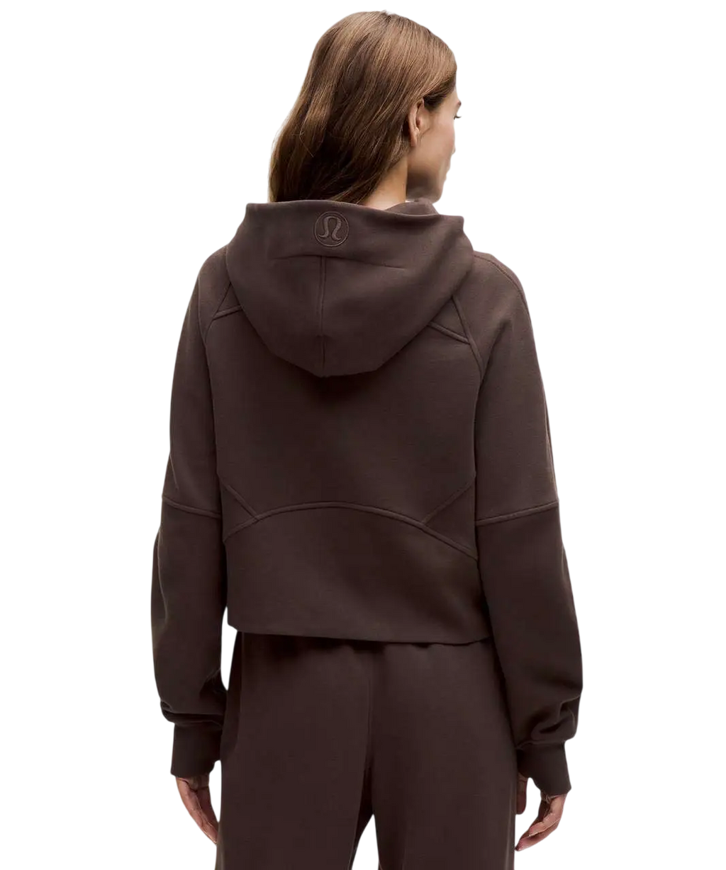 A chocolate brown lululemon scuba oversized half zip hoodie with a cropped fit and subtle seam detailing