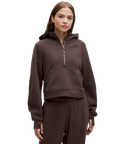 Brown lululemon scuba oversized half zip hoodie with espresso color and matching sweatpants in front view