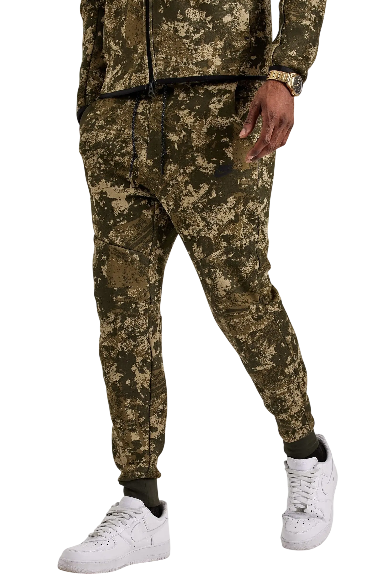 Nike tech fleece camo joggers in olive and beige camouflage with black drawstring waistband made of soft fleece material