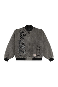 Black distressed denim bomber jacket with frayed edges and bold graphic on left sleeve by purple brand x mitchell & ness