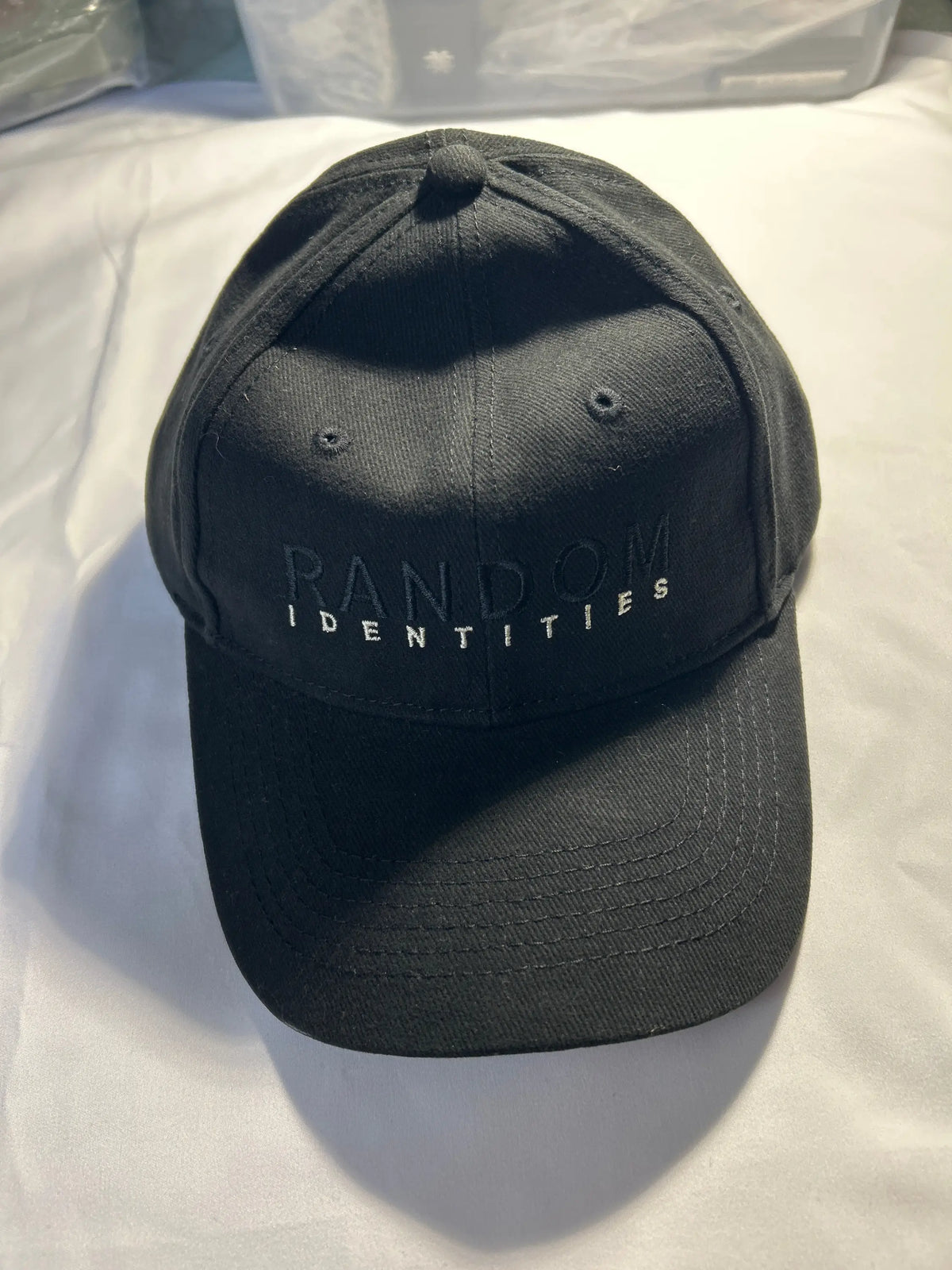 Random Identities Sponsored Strapback Baseball Hat Black
