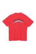 A vibrant red sacai ultimate beats and breaks short-sleeved t-shirt with a bold black and white arched graphic print