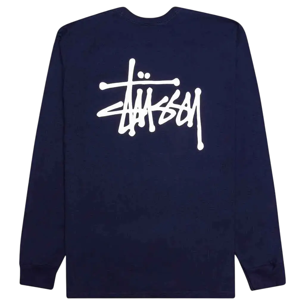 Back side of navy stussy basic long sleeve tee with bold white graffiti style logo on cotton crewneck sweatshirt