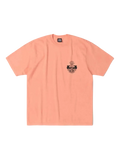 Peach-colored short-sleeved stussy built to last pigment dyed tee with small black and white chest graphic