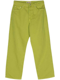 Bright lime green stussy classic jeans in washed canvas cactus with silver hardware and five-pocket design