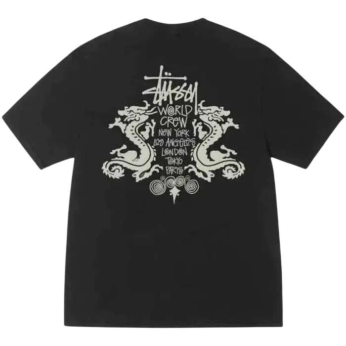 Black stussy double dragon pigment dyed tee featuring a white dragon graphic and world crew text with city names