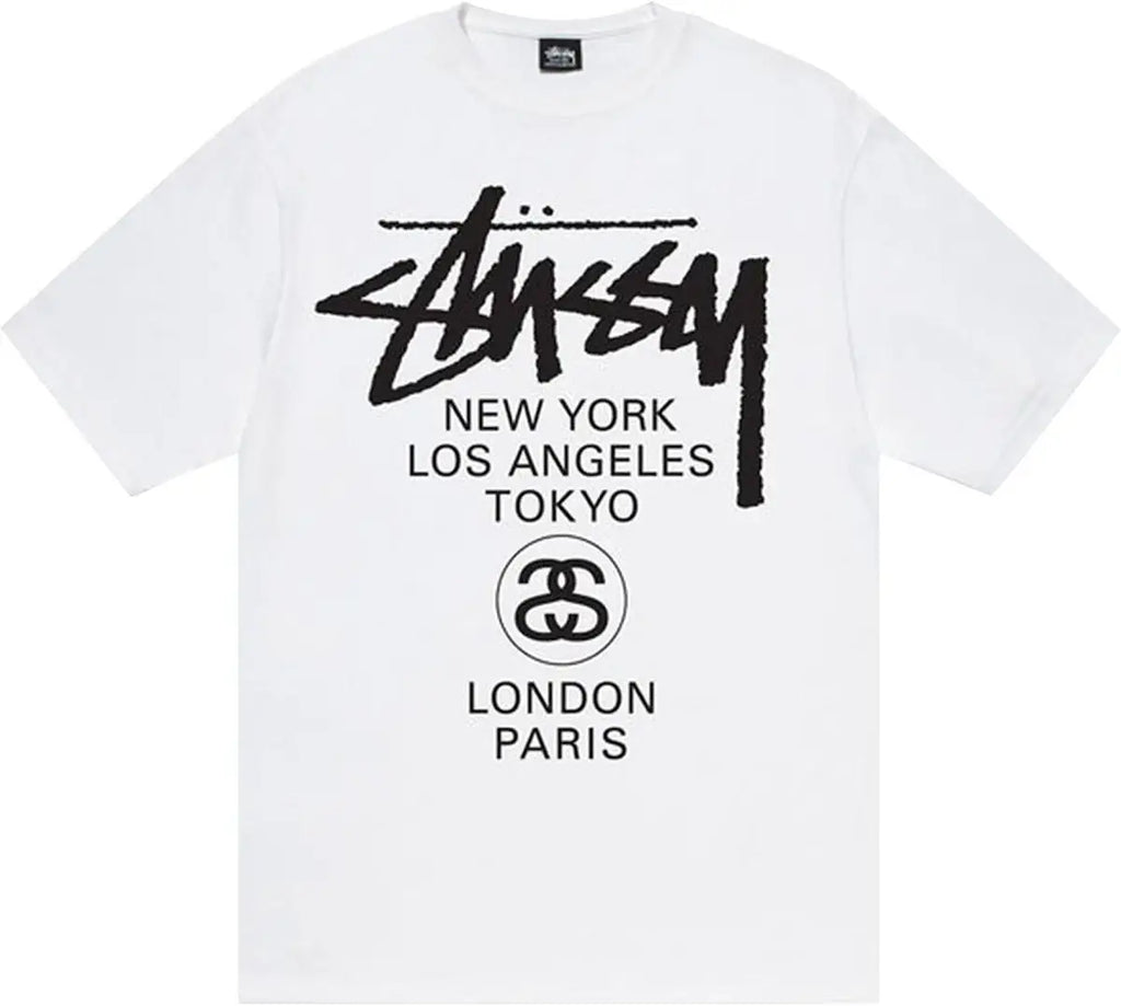 White stussy futura world tour tee featuring bold black logo graphic and city names including New York and Tokyo
