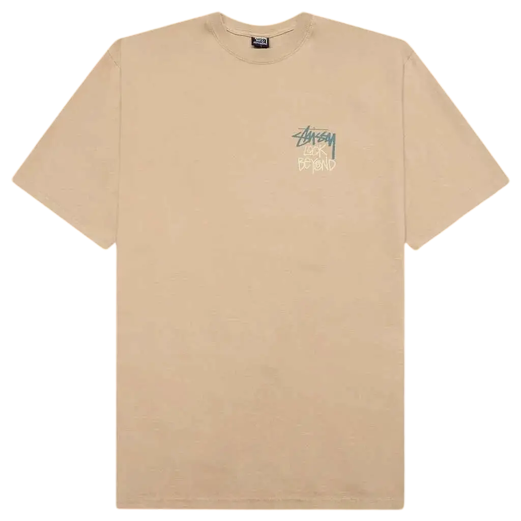 Beige Stussy Look Beyond Tee Elm t-shirt with a small stylized logo on the left chest in soft cotton material