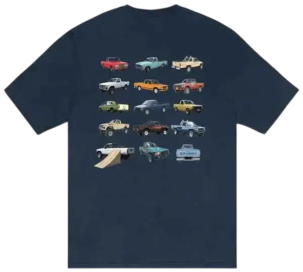 Dark blue Stussy pickup tee featuring a grid of colorful vintage pickup trucks in various models and hues