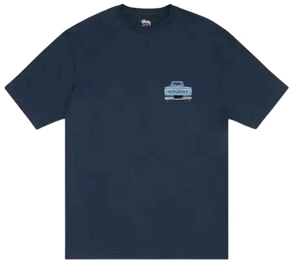 Dark blue Stussy pickup tee with short sleeves and a small white sturdy pickup truck graphic on the front