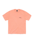 A peach-colored stussy serpent pigment dyed tee sherbet with a small black signature logo on the left chest